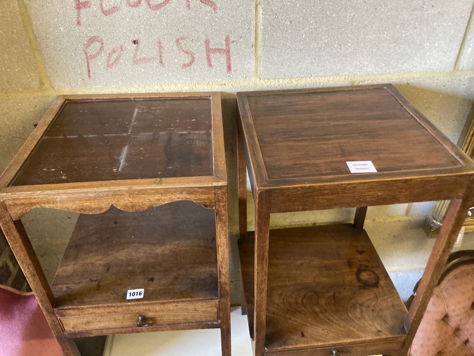 A near pair of George III mahogany washstands, larger width 35cm, depth 35cm, height 79cm